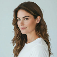 Model wearing 925 sterling silver double loop ear cuffs showing minimalist non pierced hoop earrings style for women