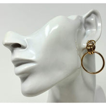 Front view of gold door knocker hoop stud earrings with a modern, elegant design, ideal for everyday fashion wear.