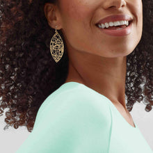 Hypoallergenic gold teardrop earrings, ideal for adding minimalist chic to any outfit.