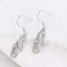 Versatile silver-plated Celtic earrings with timeless motif