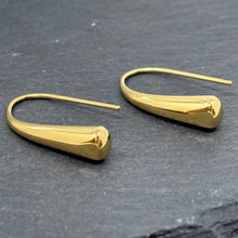 18K gold plated stainless steel teardrop hook earrings on slate background – minimalist hypoallergenic women’s jewelry
