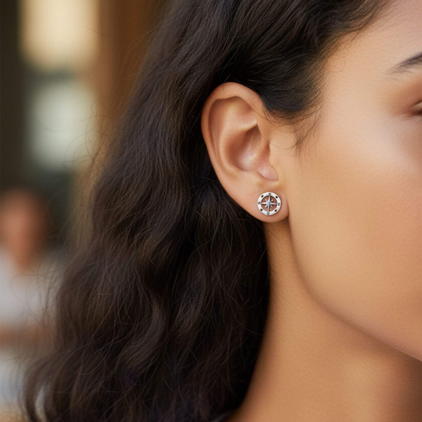 925 Sterling silver compass stud earrings worn on ear