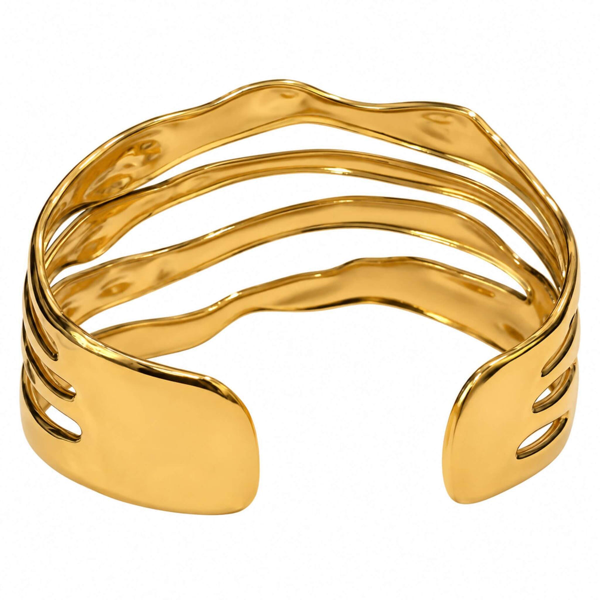 Gold plated wave cuff bracelet showing the open back and sculptural multi-band stainless steel design