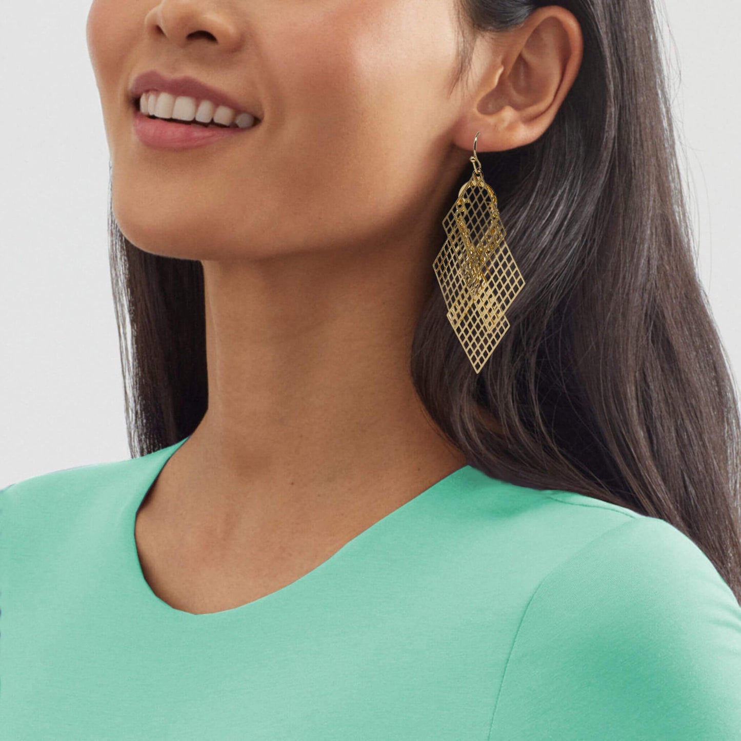 Gold Rhombus Filigree Chandelier Earrings: Shine like royalty with these opulent gold rhombus filigree chandelier earrings.