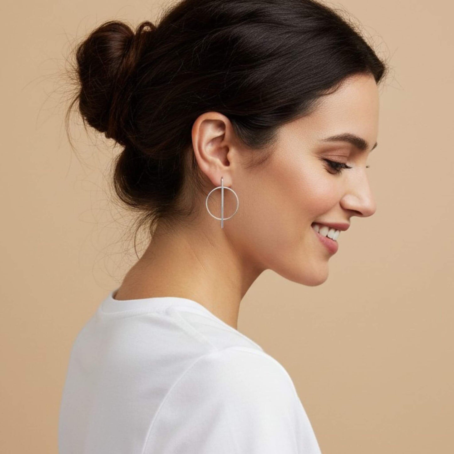 Large 925 sterling silver bar and circle geometric stud earrings worn by smiling model in profile, showing full size and minimalist design against neutral background