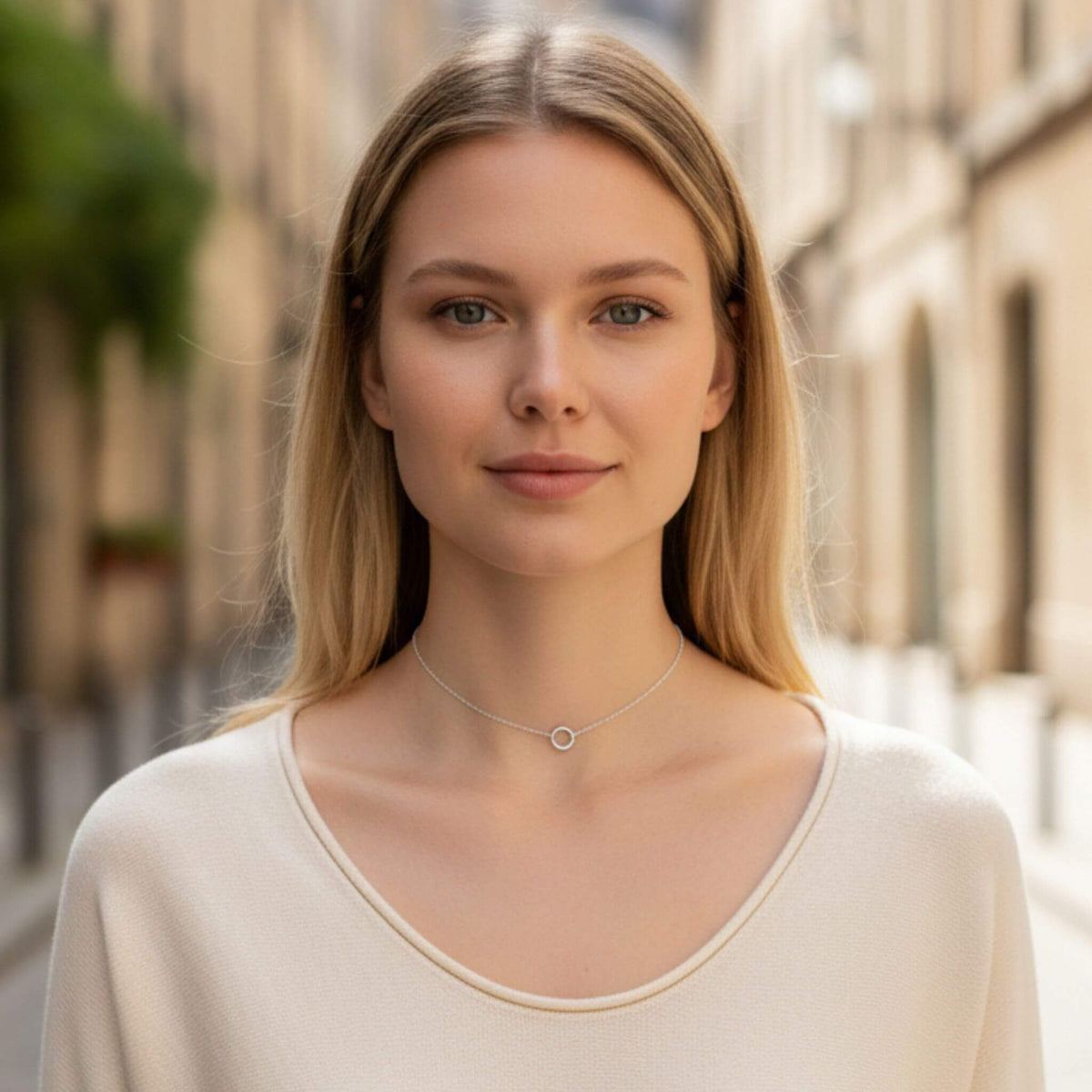 Minimalist sterling silver open circle choker necklace styled for everyday wear