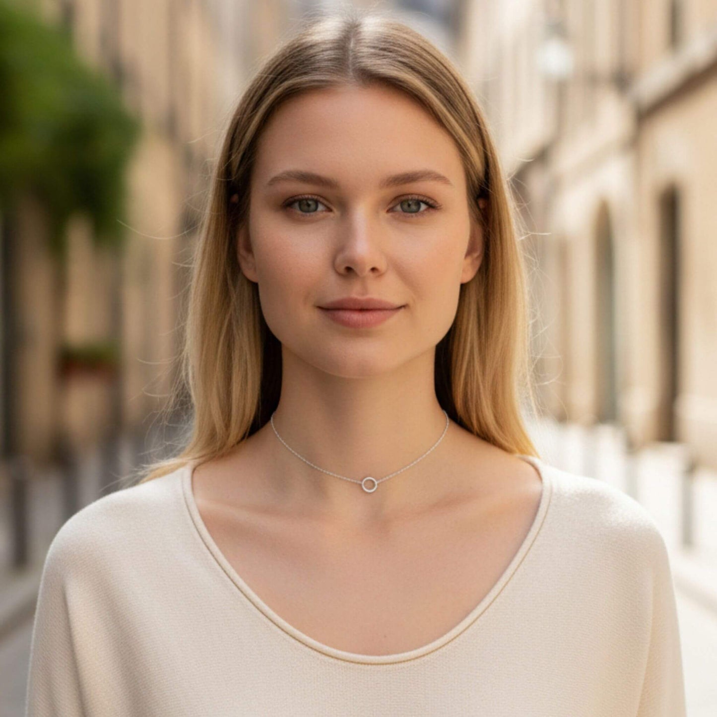Minimalist sterling silver open circle choker necklace styled for everyday wear