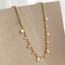 Stylish tarnish-resistant gold necklace with multi-size geometric charms
