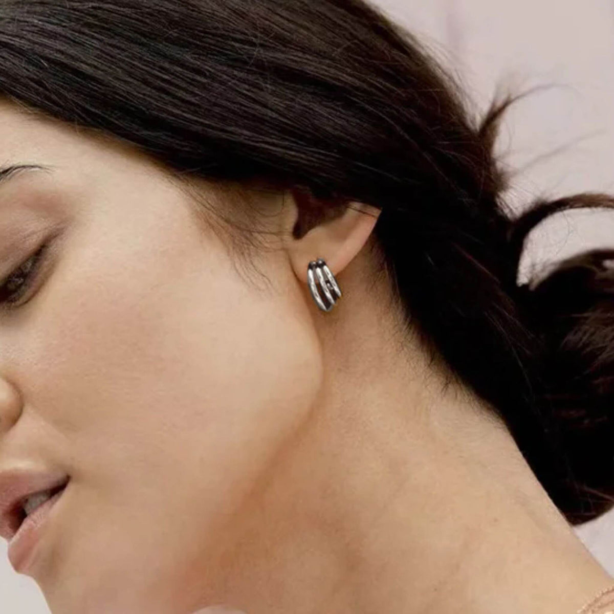 25mm multilayer hoop earrings worn in silver plated finish