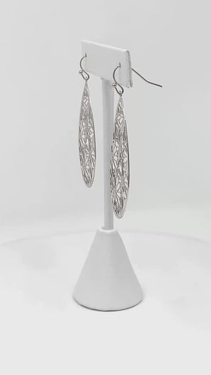 Daisy Teardrop Earrings, suitable for various styles and worn by diverse individuals.
