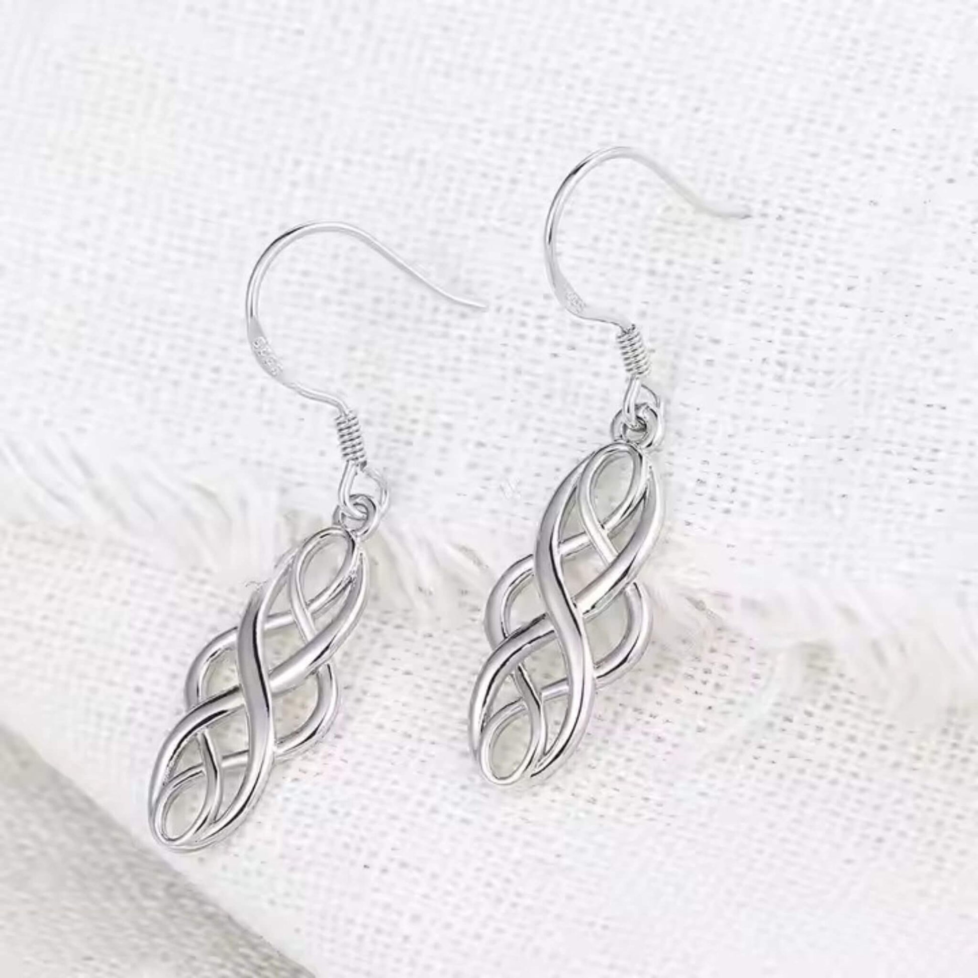 Versatile silver-plated Celtic earrings with timeless motif
