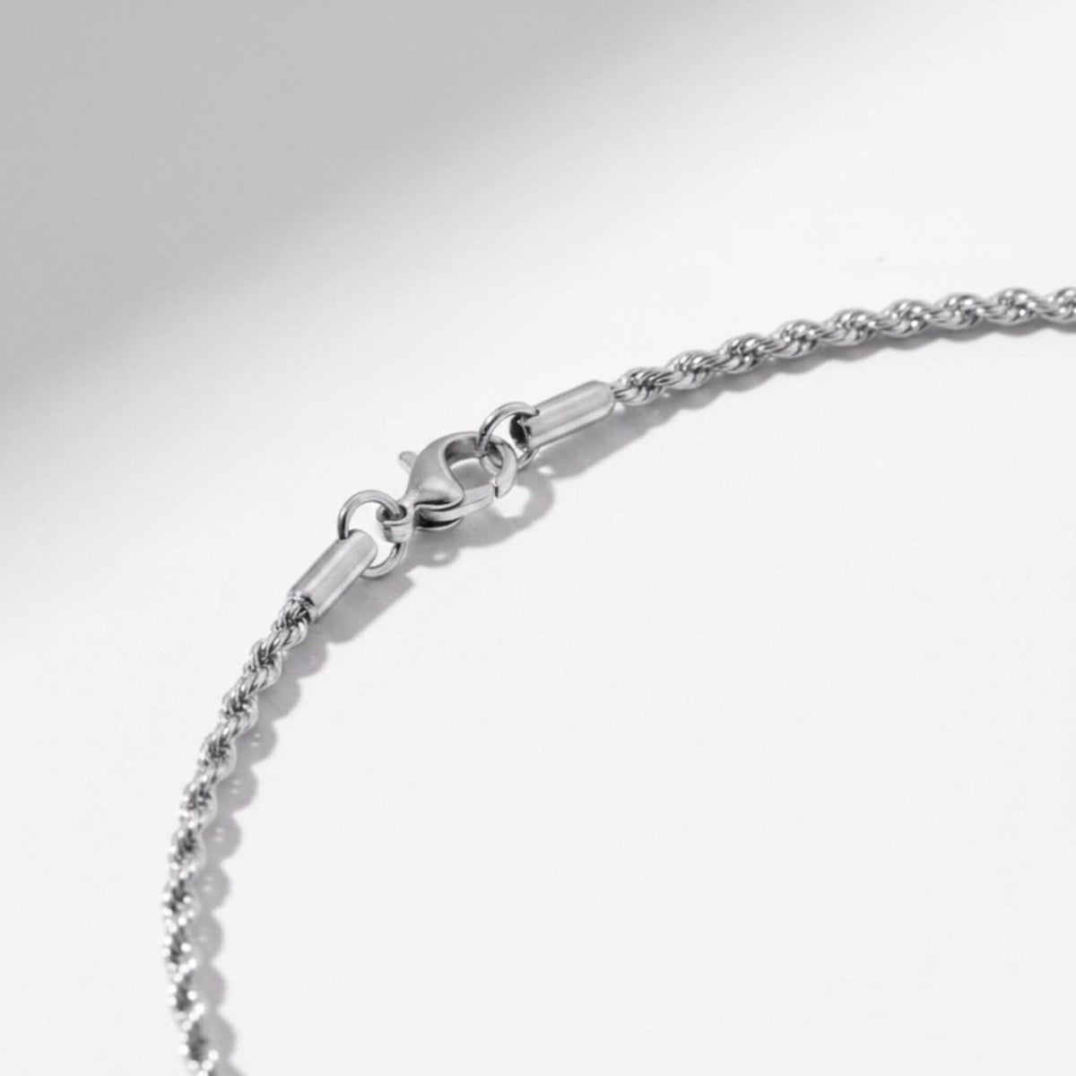 Stainless steel rope necklace secure lobster claw clasp close-up