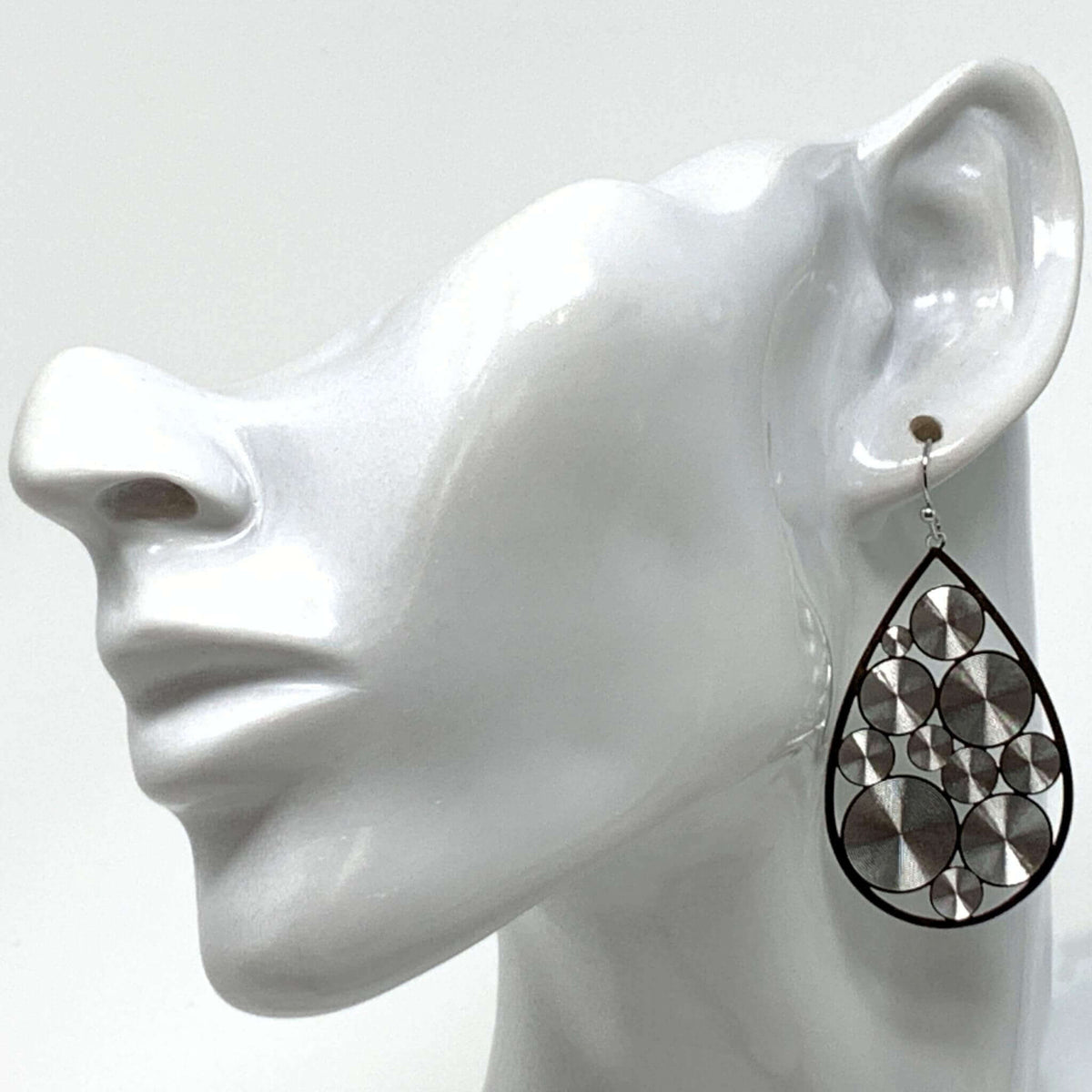 Dangle earrings with mini spiral discs