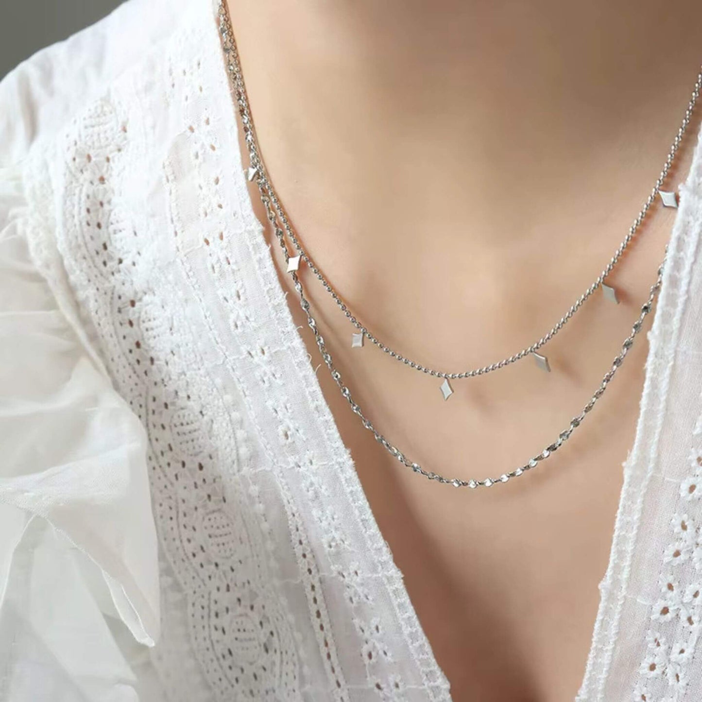 Versatile silver geometric double necklace - ideal for stacking or wearing solo