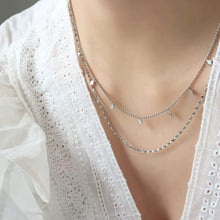 Versatile silver geometric double necklace - ideal for stacking or wearing solo
