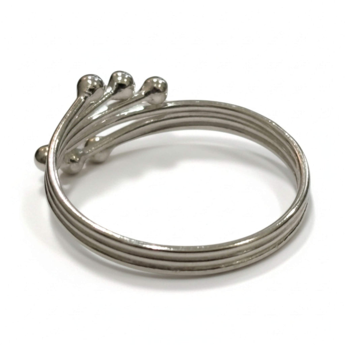 Side view of sterling silver adjustable ball ring with layered band detail