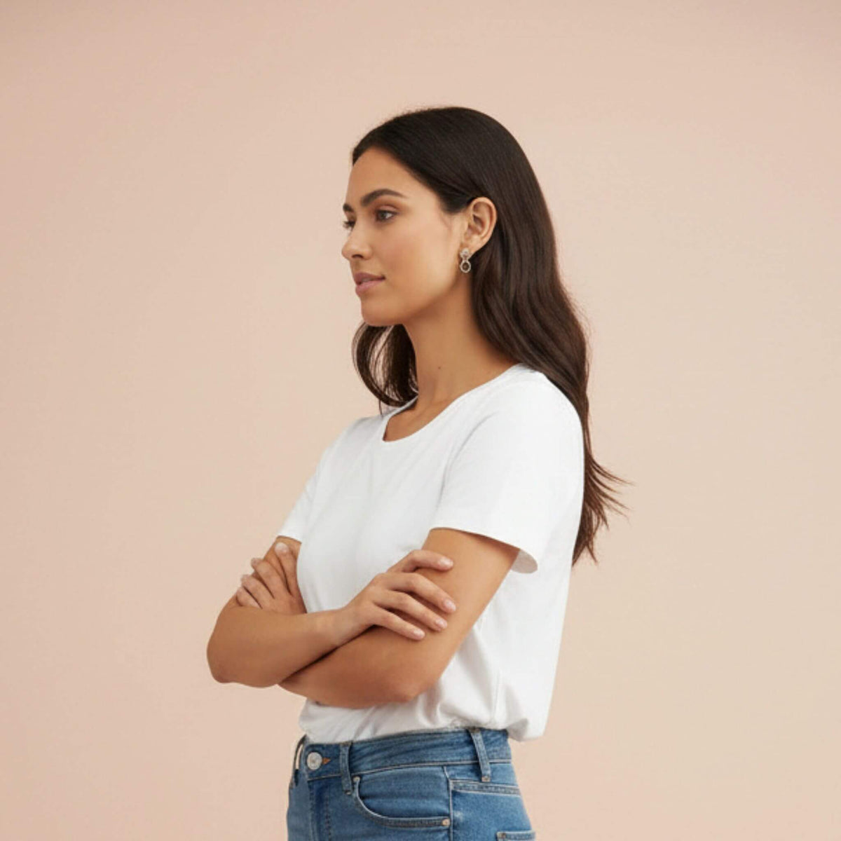 Woman wearing sterling silver interlocking circle drop earrings