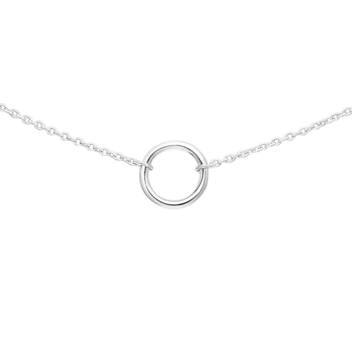 Close-up of sterling silver open circle pendant on delicate rolo chain