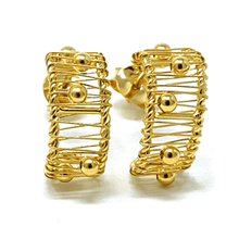 Front view of lightweight gold plated c-hoop earrings, highlighting crescent shape and bead accents
